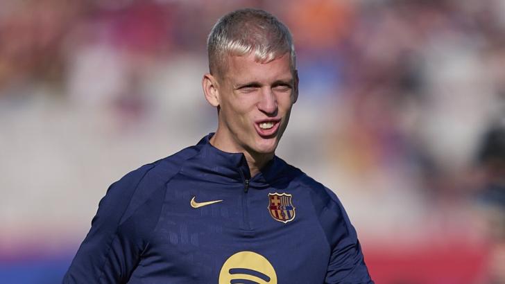 Dani Olmo of Barcelona warming up on the pitch ahead of a La Liga game